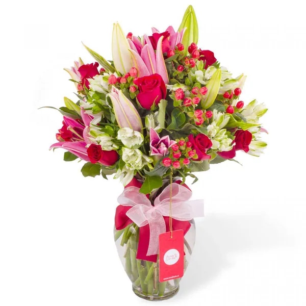 Alejandra en Ánfora - florero liliums rosado y rosas rojo