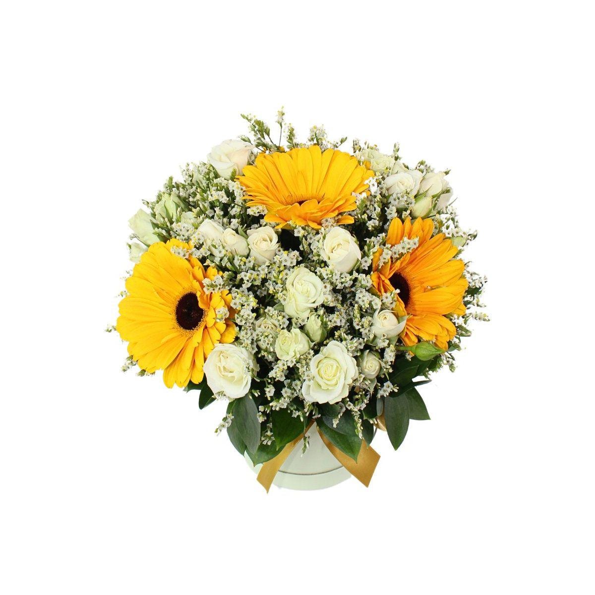 Mariana en sombrerero amarillo - Arreglo floral con gerberas amarillo, minirosas y limonium - Imagen 1