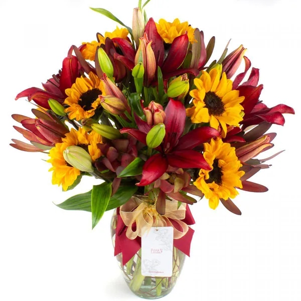 Saludo al sol rojo - Ánfora con liliums rojos, girasoles y leucadendros